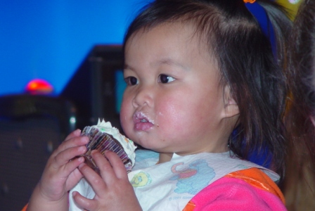Kasen eating birthday cupcake